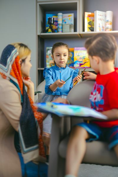 Teacher teaching children in a classroom